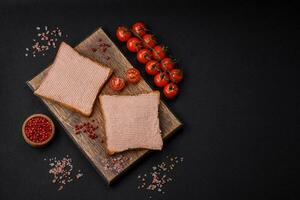 Delicious crispy toast with chicken or goose pate with salt and spices photo