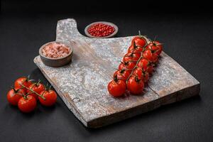 Knife, fork and cutting board, salt, pepper and other ingredients photo