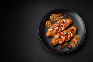 Delicious fresh crispy pastry in the form of a pigtail with strawberries and blueberries photo