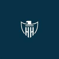 HH initial monogram logo for shield with eagle image vector design