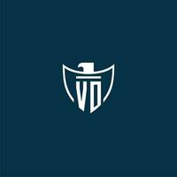 VO initial monogram logo for shield with eagle image vector design