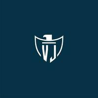 VJ initial monogram logo for shield with eagle image vector design