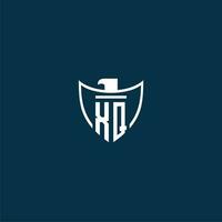 XQ initial monogram logo for shield with eagle image vector design