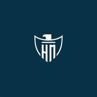 HM initial monogram logo for shield with eagle image vector design