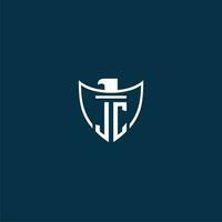 JC initial monogram logo for shield with eagle image vector design
