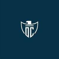 OC initial monogram logo for shield with eagle image vector design