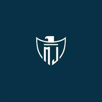 MJ initial monogram logo for shield with eagle image vector design