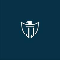 JJ initial monogram logo for shield with eagle image vector design