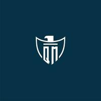 QM initial monogram logo for shield with eagle image vector design