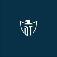 DT initial monogram logo for shield with eagle image vector design