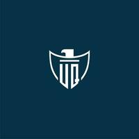 UQ initial monogram logo for shield with eagle image vector design