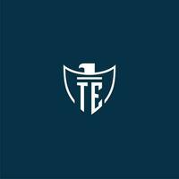 TE initial monogram logo for shield with eagle image vector design