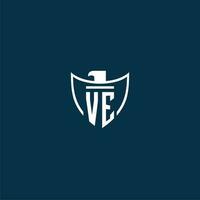 VE initial monogram logo for shield with eagle image vector design