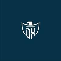 DX initial monogram logo for shield with eagle image vector design