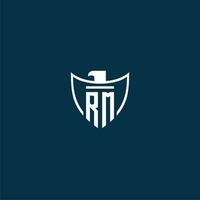 RM initial monogram logo for shield with eagle image vector design