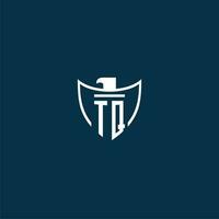 TQ initial monogram logo for shield with eagle image vector design