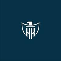 HK initial monogram logo for shield with eagle image vector design