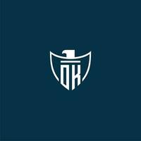 OK initial monogram logo for shield with eagle image vector design