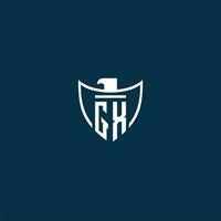 GX initial monogram logo for shield with eagle image vector design