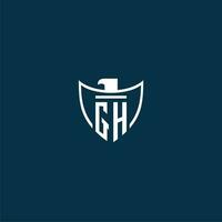 GH initial monogram logo for shield with eagle image vector design