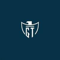 GT initial monogram logo for shield with eagle image vector design