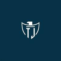 TJ initial monogram logo for shield with eagle image vector design