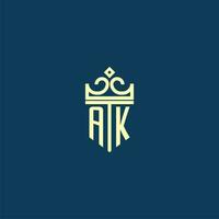 AK initial monogram shield logo design for crown vector image