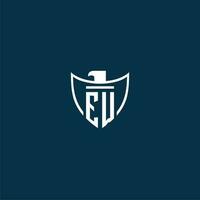 EW initial monogram logo for shield with eagle image vector design