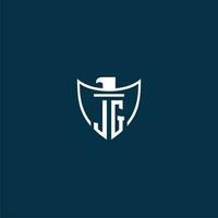 JG initial monogram logo for shield with eagle image vector design