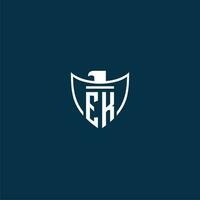 EK initial monogram logo for shield with eagle image vector design