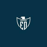 EO initial monogram logo for shield with eagle image vector design