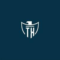 TX initial monogram logo for shield with eagle image vector design