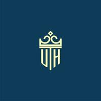 UH initial monogram shield logo design for crown vector image