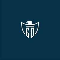 GO initial monogram logo for shield with eagle image vector design