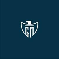 GM initial monogram logo for shield with eagle image vector design