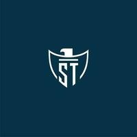 ST initial monogram logo for shield with eagle image vector design