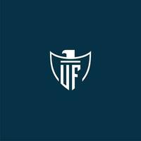 UF initial monogram logo for shield with eagle image vector design