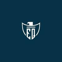 EQ initial monogram logo for shield with eagle image vector design