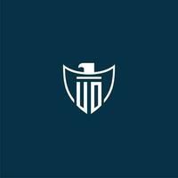 UO initial monogram logo for shield with eagle image vector design