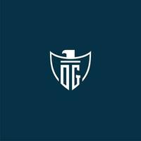 OG initial monogram logo for shield with eagle image vector design