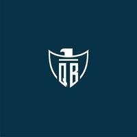 QB initial monogram logo for shield with eagle image vector design