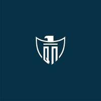 QN initial monogram logo for shield with eagle image vector design