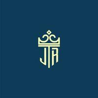 JR initial monogram shield logo design for crown vector image