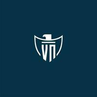 VN initial monogram logo for shield with eagle image vector design