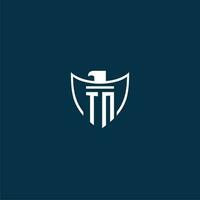 TN initial monogram logo for shield with eagle image vector design