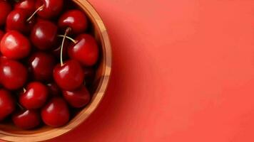 Beat see on organized sweet cherries in wooden bowl in sunshine on getting to be flushed establishment. Video animation