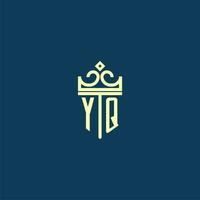 YQ initial monogram shield logo design for crown vector image