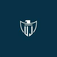 UJ initial monogram logo for shield with eagle image vector design