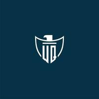 WQ initial monogram logo for shield with eagle image vector design
