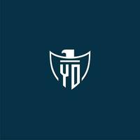 YO initial monogram logo for shield with eagle image vector design